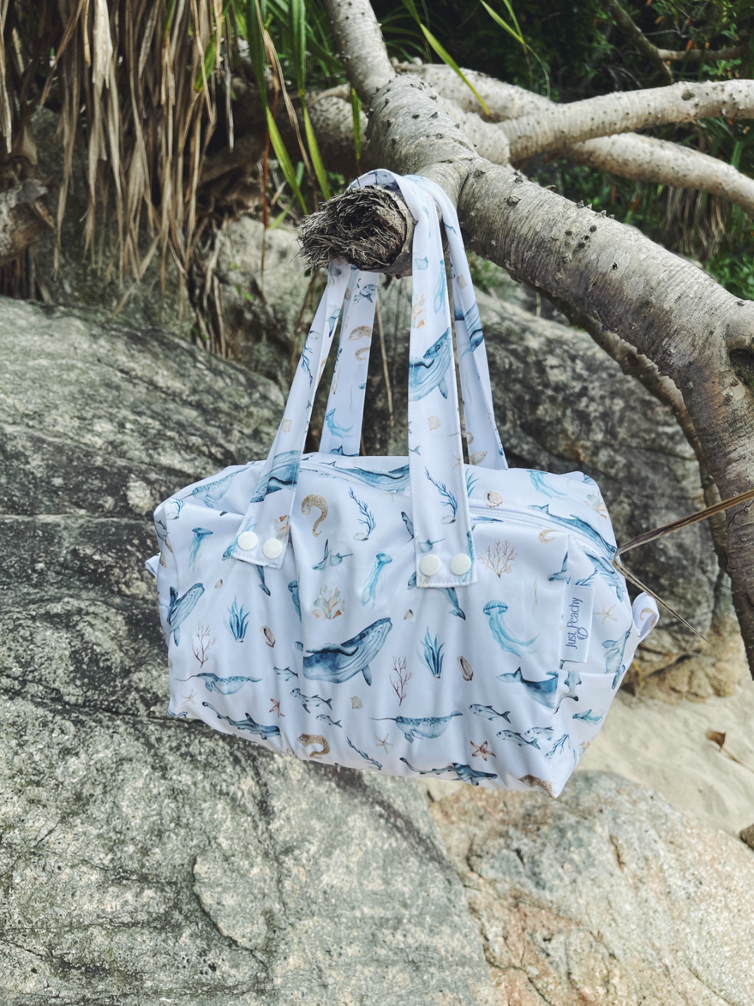 This spacious, structured, splash-proof diaper pod is perfect for organization of your baby’s cloth diapers, clothes or shoes whether at home or on the go. Get a different print for each family member to keep their own packing organized! Also works great for packing big kids shoes.clothes for travel, work or school.