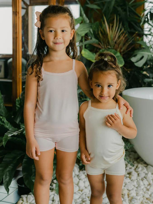 These shorties are super soft and gentle on your little ones' skin. Designed with a snug fit for play. Move in comfort for any activity with silky, breathable full coverage. Enjoy a comfy night's rest. Made with TENCEL™ Micro Modal Fibers with Eco Soft Technology. This set includes: 1x cream and 1x pink shorties.