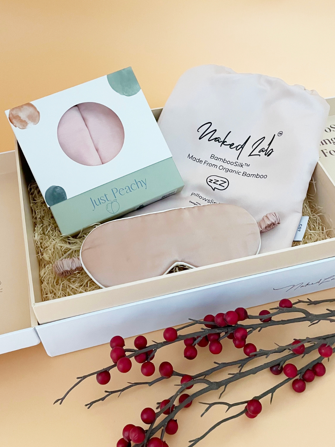 Spoil little ones with this Limited Edition Feel Good Snoozin’ Gift Set curated in collaboration with NakedLab. Each set includes Just Peachy TENCEL™ Micro Modal Top & Bottom, NakedLab Bamboo Silk Kids Pillowcase and a luxurious sleep mask for a peaceful night’s rest. Shop now. Pink color gift set for kids.