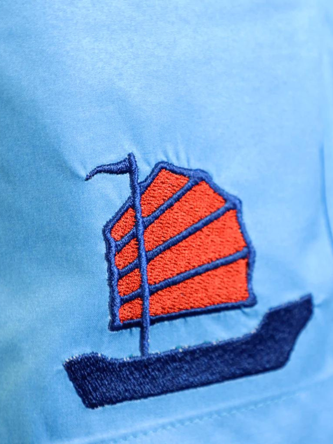 boys swim shorts swim trunks sustainable fashion made from recycled plastic bottles tropical junk boat Hong Kong-inspired