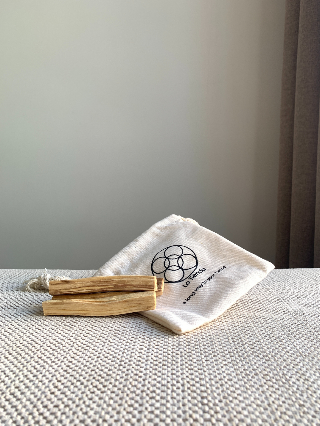 Burn Palo Santo sticks at home or in your office to help clear the air and refresh your space.