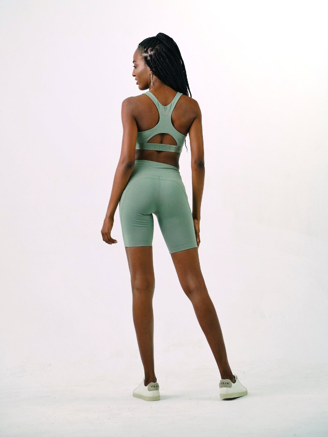 green biker shorts eco-friendly activewear made from recycled plastic bottles