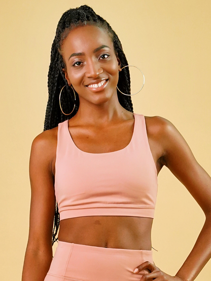 essential sports bra peach pink women's ethical activewear made from recycled plastic