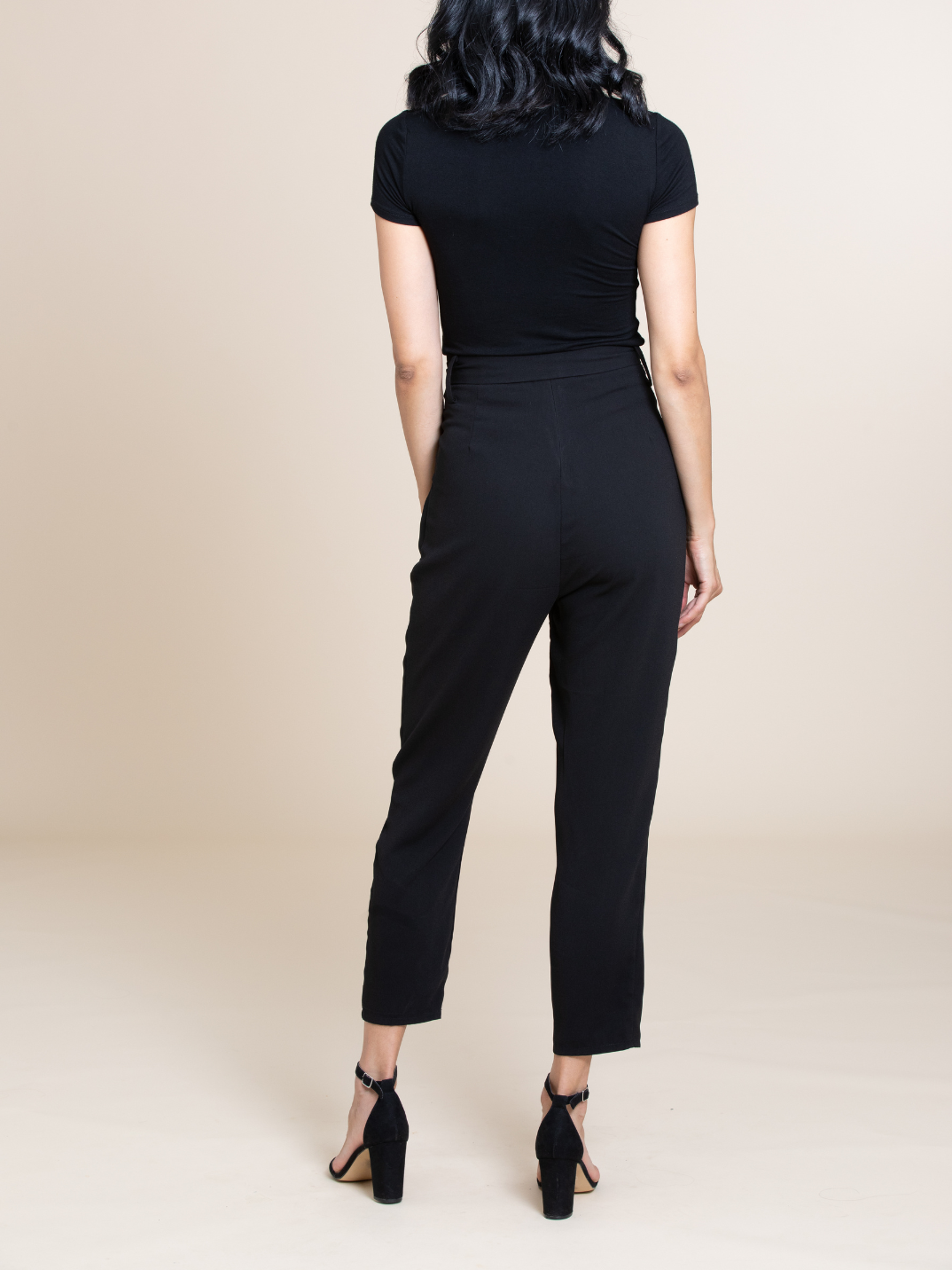 The most flattering trousers out there, we promise. The Lexi combine comfort and style with an easy-yet-sophisticated silhouette and paper bag waist. Pair with heels for work or throw on sneakers and the Kara bodysuit for casual comfort. Breathable and wrinkle-resistant fabric for 100% convenience. shop sustainable fashion capsule wardrobe