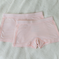 These shorties are super soft and gentle on your little ones' skin. Designed with a snug fit for play. Move in comfort for any activity with silky, breathable full coverage. Enjoy a comfy night's rest. Made with TENCEL™ Micro Modal Fibers with Eco Soft Technology. This set includes: 2x pink shorties. Shop now.