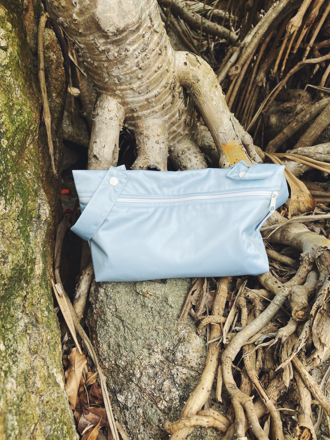 This Little Essentials double-lined, waterproof pouch is perfect for keeping your diaper bag or mommy/daddy bag organized! It’s the perfect size for all your little one’s little essentials that you need to access easily, whether it’s on a walk to the park, long-haul travel or cot-side and by your changing station.