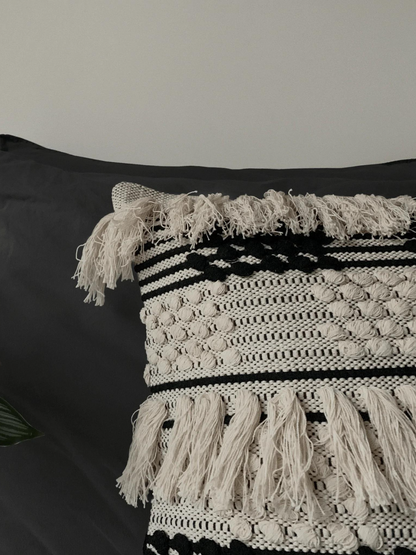 Travis fringe cushion monochrome modern bohemian style shop women-owned sustainable eco-friendly home goods made in India nice decorative pillow