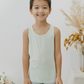 These tank tops are super soft and gentle on your little ones' skin. Designed with a loose, unisex fit for play, movement and a comfy night's rest. Wear the breathable layer under garments for day or snooze in the ultimate comfort. Made with modal interwoven with eco-soft technology. Comes with: 2x green tank tops.