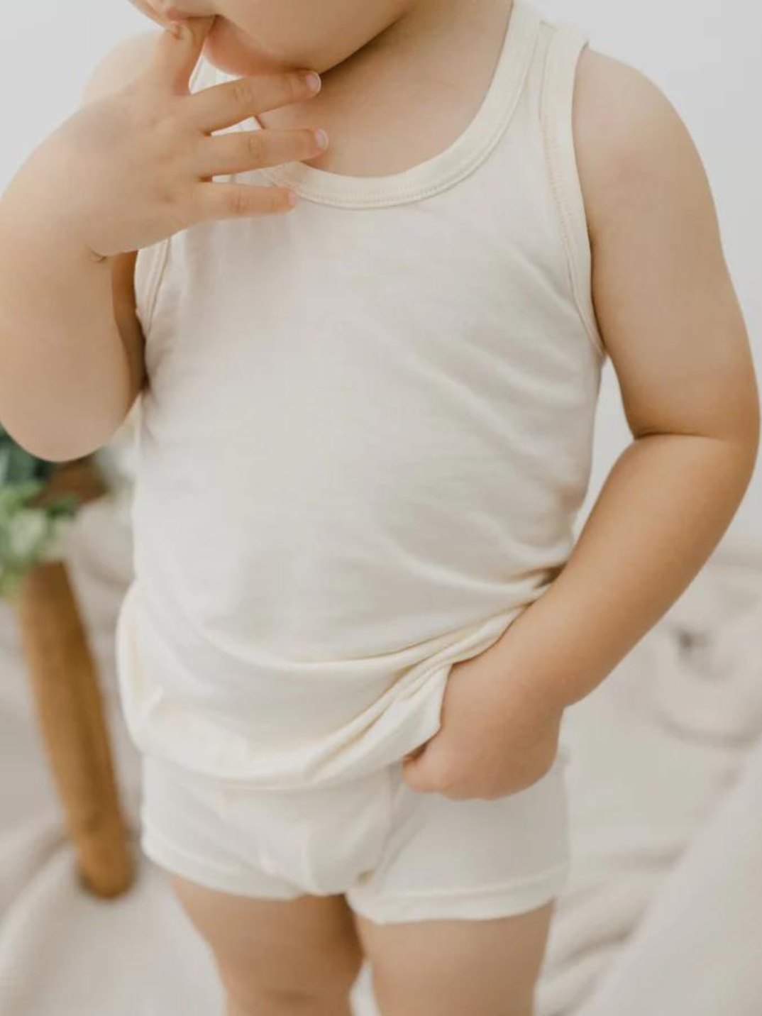 These tank tops are super soft and gentle on your little ones' skin. Designed with a loose, unisex fit for play, movement and a comfy night's rest. Wear the breathable layer under garments for day or snooze in the ultimate comfort. Made with modal interwoven with eco-soft technology. Comes with: 2x cream tank tops.