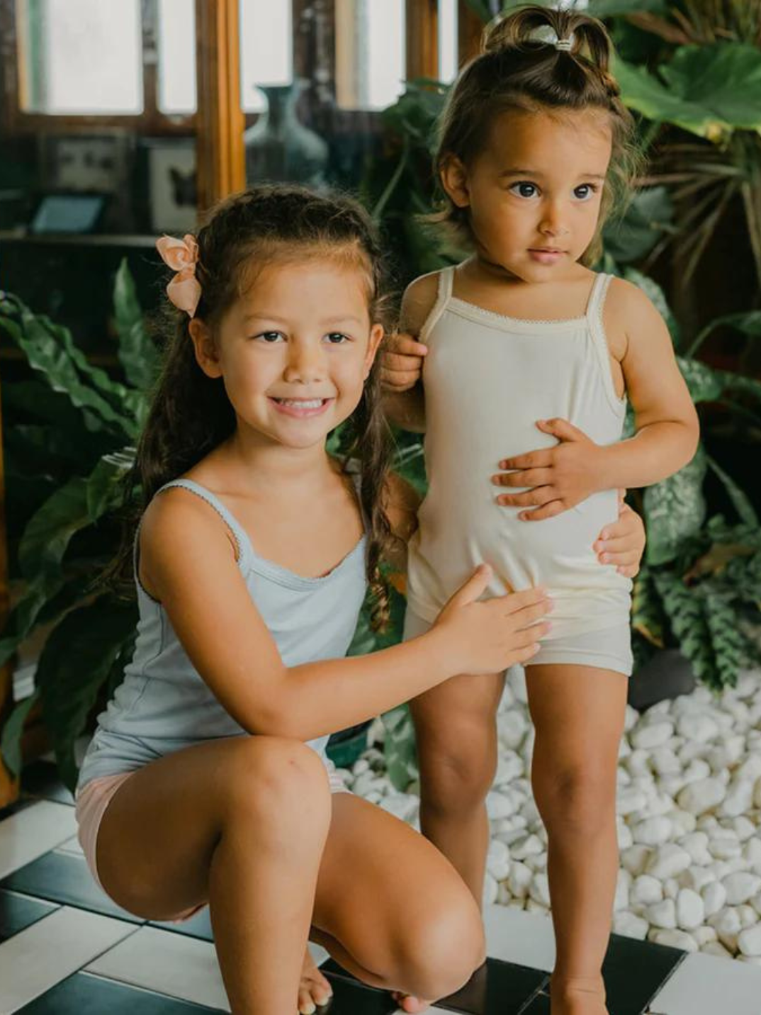 Just Peachy Camisoles are super soft and gentle on your little ones' skin. Designed with a snug fit for play, movement and a comfy night's rest. Add the breathable Camisole layer under your day clothes or snooze in maximum comfort. Blue and cream colors children's camis. Comes in a 2-pack