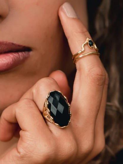With an adjustable band you can explore many different ways to wear our Obsidian semi precious stone ring made with 18 Karat vermeil gold. It’ll be sure to impress and we can’t wait for you to try it on! Shop now.