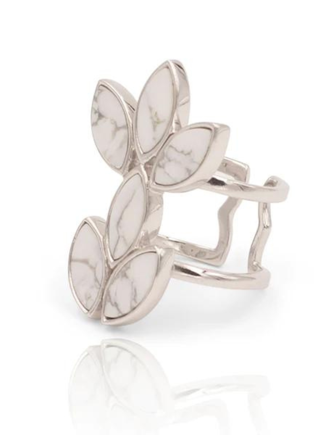 Sterling silver floral escape ring inlaid with hand cut magnesite. You will love the grey marble affect of this semi precious stone.  Details: Our cocktail rings will help enhance any outfit and remind you of your unique and natural beauty.