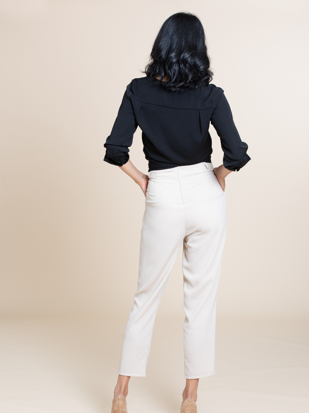 A wardrobe must have. The Alexa wrap top is a versatile and ultra-stylish piece that is an instant outfit elevator. Dressing up? Wear with our Lexi trousers or Marnie skirt for a chic, office-ready look. Dressing down? Swap the heels out for sneaks and throw on a pair of jeans. Available in white, olive green, and black.