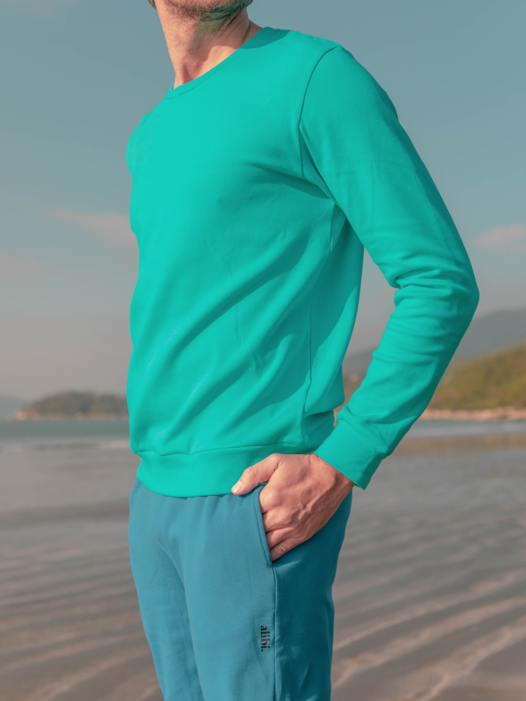 blue sweatshirt that's water-resistant, bacterially-defensive and ecologically-sustainable.