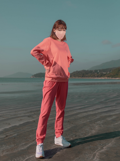 coral sweatshirt that's water-resistant, bacterially-defensive and ecologically-sustainable.