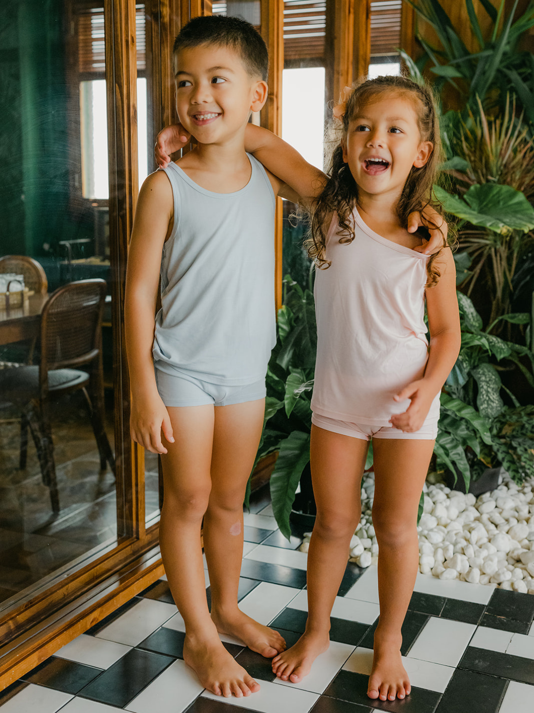 These tank tops are super soft and gentle on your little ones' skin. Designed with a loose, unisex fit for play, movement and a comfy night's rest. Wear the breathable layer under garments for day or snooze in the ultimate comfort. Made with eco modal fabric. Comes with: 1x pink tank top and 1x blue tank top.