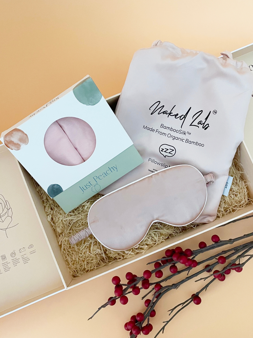 Spoil little ones with this Limited Edition Feel Good Snoozin’ Gift Set curated in collaboration with NakedLab. Each set includes Just Peachy TENCEL™ Micro Modal Top & Bottom, NakedLab Bamboo Silk Kids Pillowcase and a luxurious sleep mask for a peaceful night’s rest. Shop now. Pink color gift set for kids.