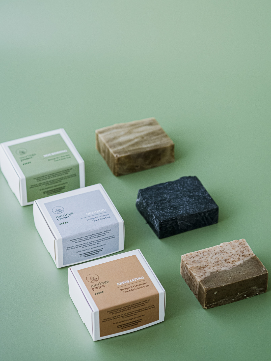 detoxing moringa oil and charcoal face and body soap shop sustainable ethical natural skincare made in Thailand