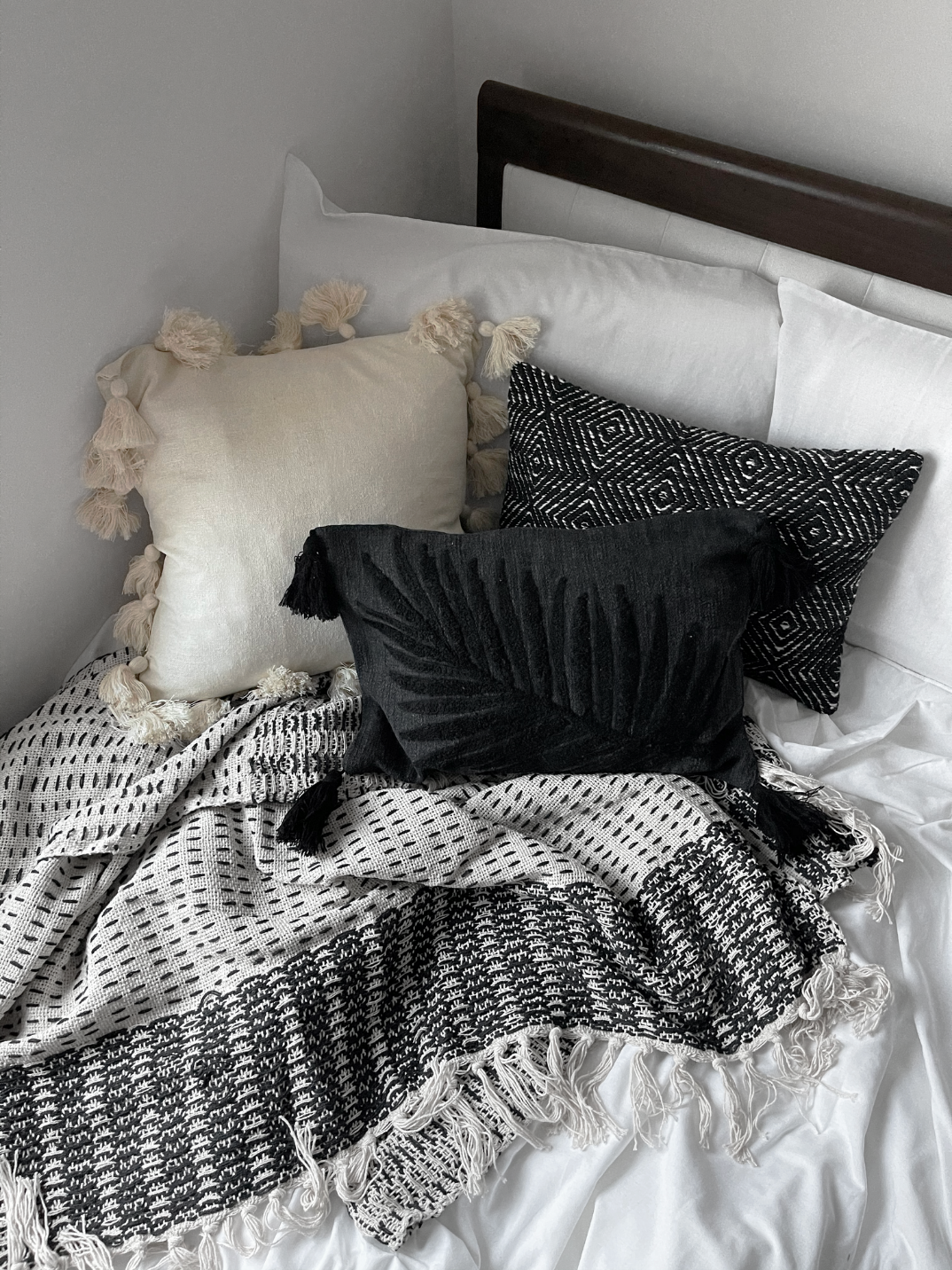 Our classic black and white striped cotton slub throw is a bold statement piece for all sofas and beds. hand embroidered in Indiaa