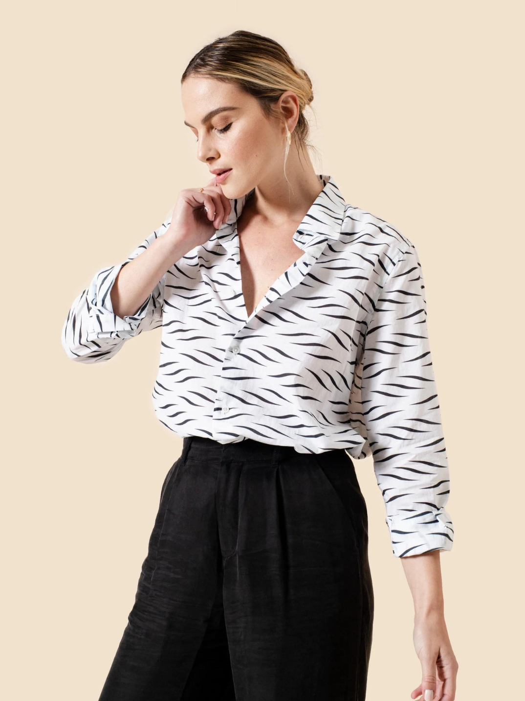 Every capsule wardrobe needs a classic shirt – and you’ve found it with The Avery Button Down. Made from 100% organic cotton, The Avery combines comfort with a polished finish. Tie with a front knot for a more relaxed weekend vibe, or tuck in for an instantly elevated work look. shop sustainable fashion women's clothing
