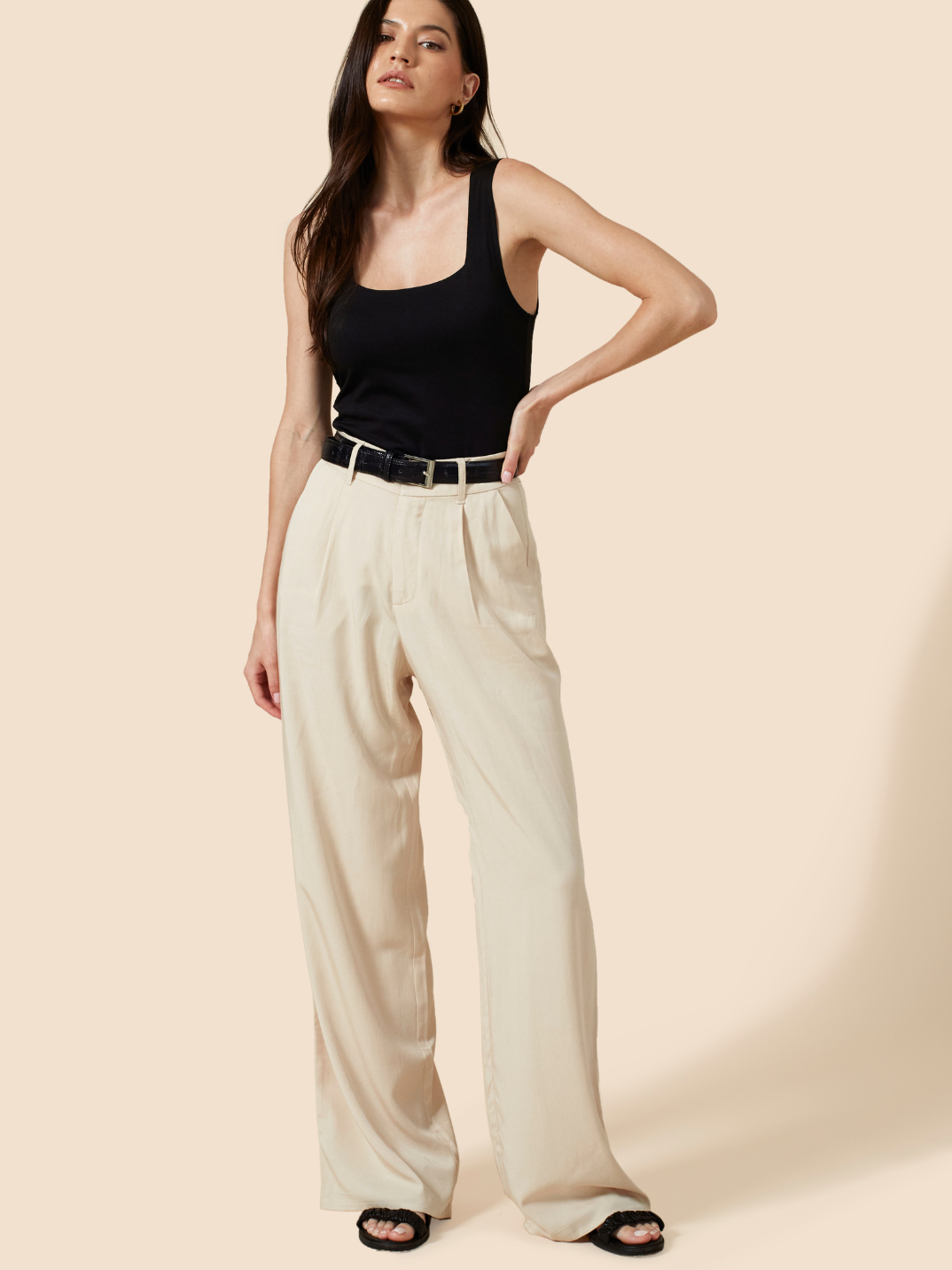 No capsule wardrobe is complete without that perfect pair of wide leg pants. Cut from an ultra-soft, light-weight natural fiber, the Willow Wide Leg Pants are a high-waisted design that elongate the silhouette. Featuring an elastic back waistband and side pockets, these pants guarantee tailored comfort. Ideal for an effortlessly cool look with sneakers, or occasion dressing with heels. Create a matching co-ordinated set with The Noah Blazer.
