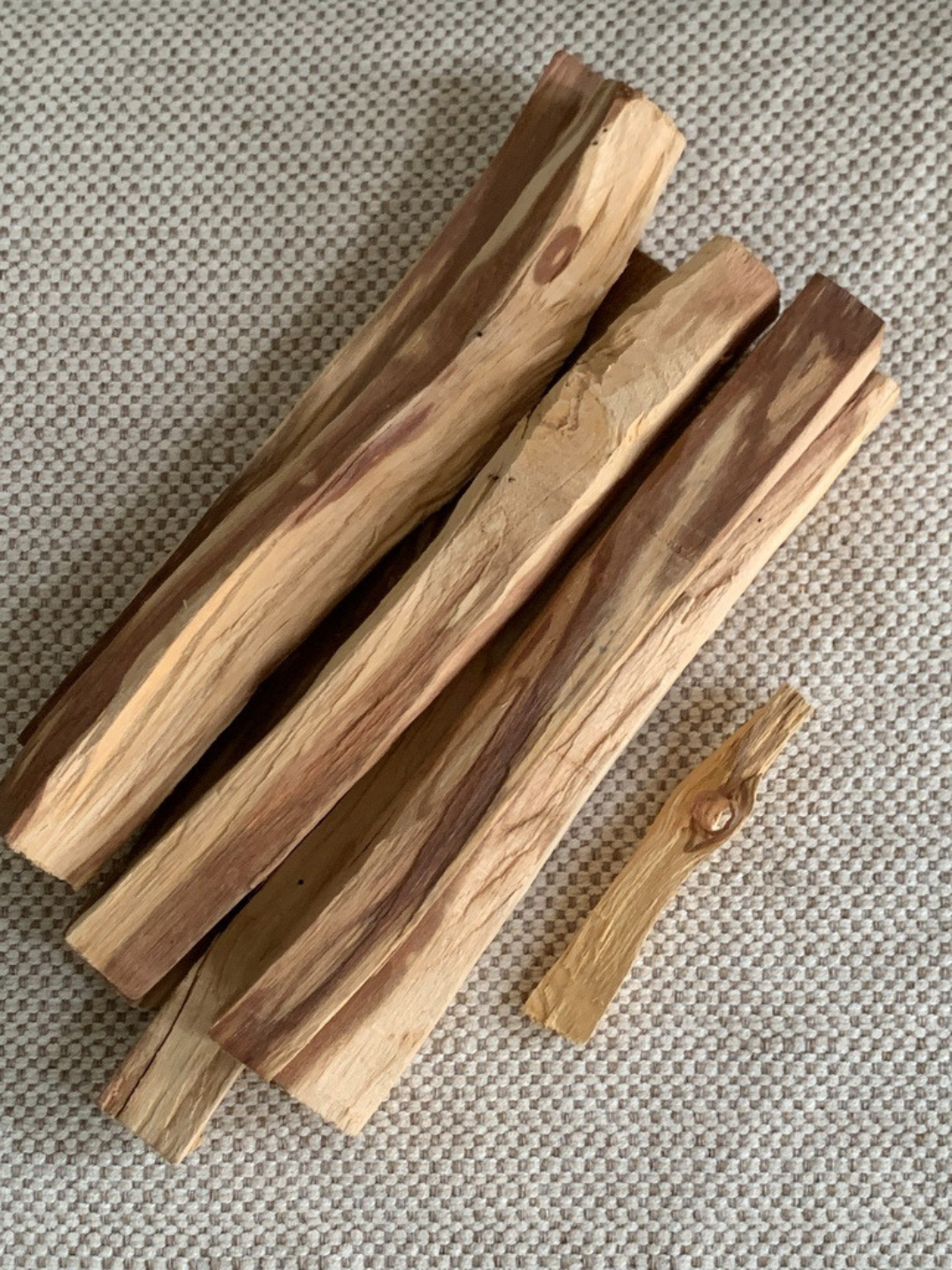 Burn Palo Santo sticks at home or in your office to help clear the air and refresh your space.