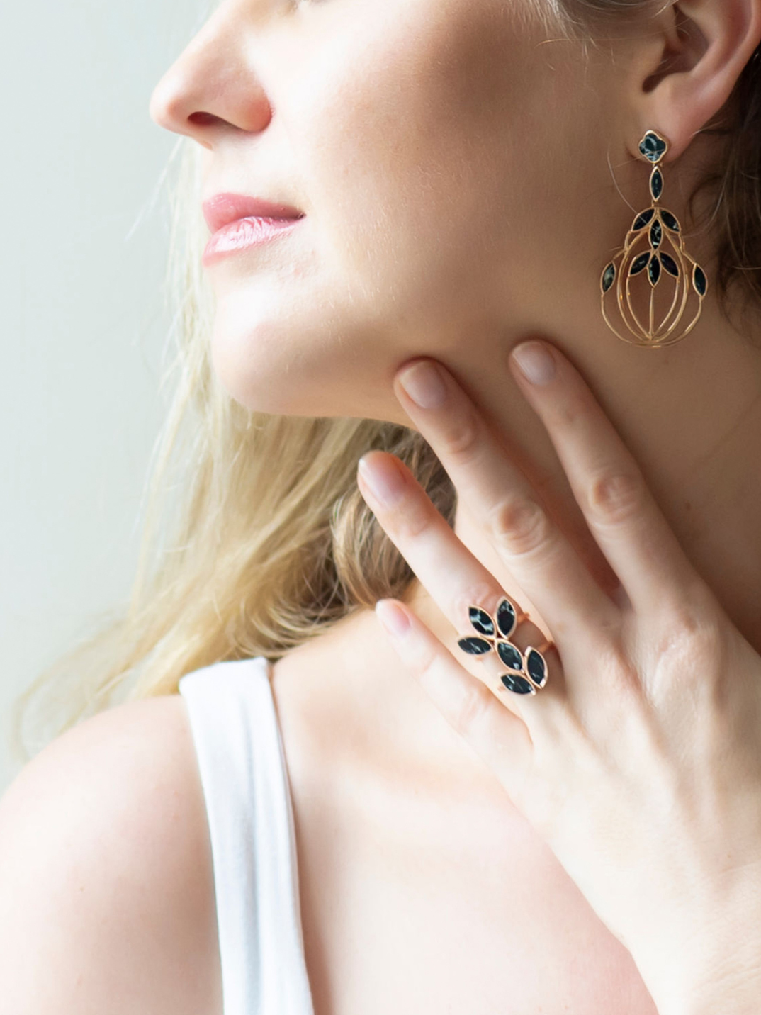 Rose Gold plated over sterling silver our floral escape ring is inlaid with hand cut black marble ceramic. Inspired by nature and floral mosaics. timeless handcrafted jewelry ethically made