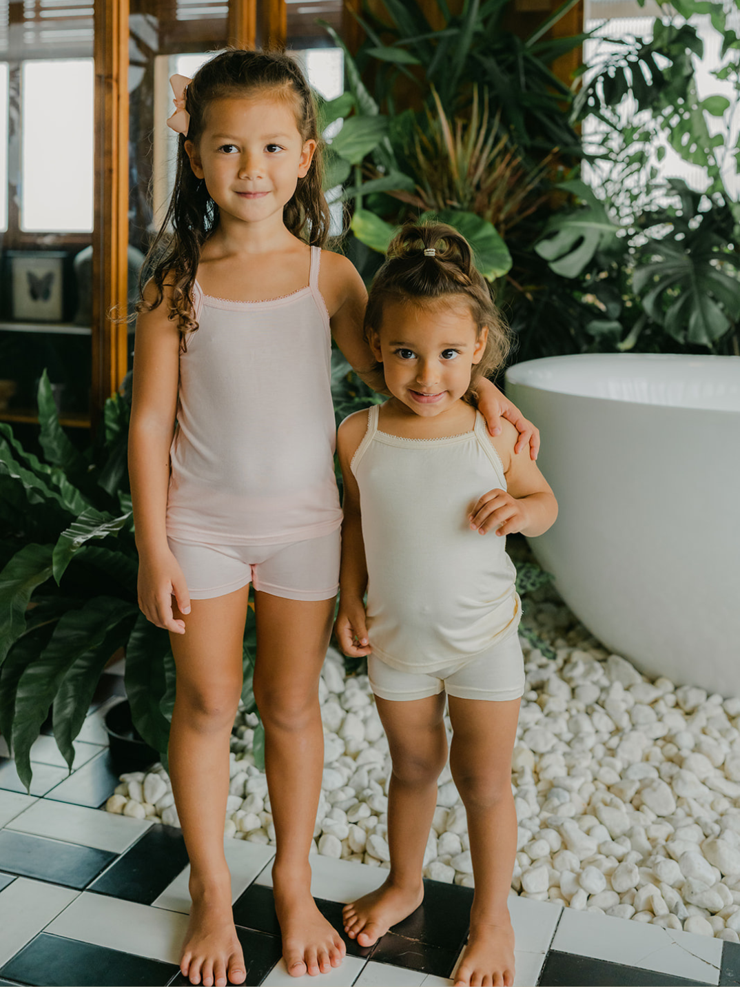 Just Peachy Camisoles are super soft and gentle on your little ones' skin. Designed with a snug fit for play, movement and a comfy night's rest. Add the breathable Camisole layer under your day clothes or snooze in maximum comfort. Pink and cream children's camis. Comes in a 2-pack