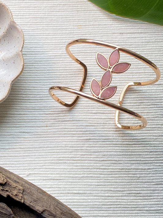 Rose Gold Vermeil our floral escape bracelet is inlaid with hand cut pink opal. Inspired by nature and floral mosaics, you'll fall in love with this pink semi precious stone and rose gold combination. ethical handcrafted jewelry sustainable brand