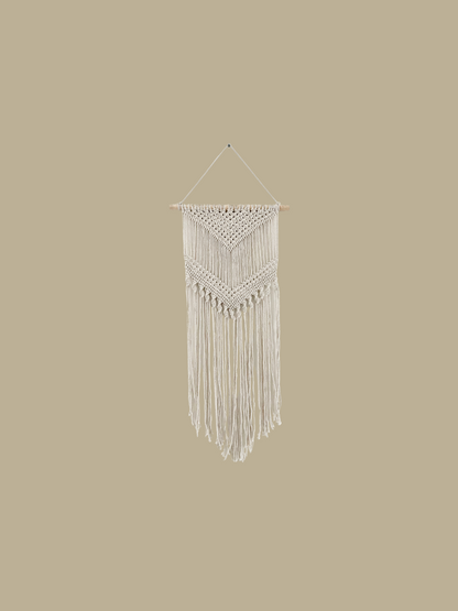 Our handcrafted macramé hanging tapestry is a a beautiful combination of a modern Bohemian style.
